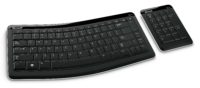 Image 1 : Un clavier Bluetooth et son pavé externe